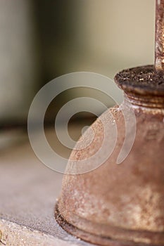 Old vintage rusty metal oil can