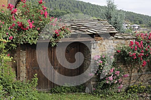 Old vintage rusty village gate