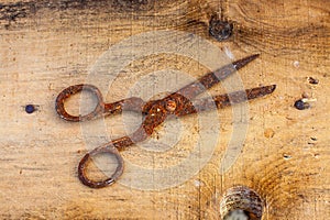 Old vintage scissors covered in rust