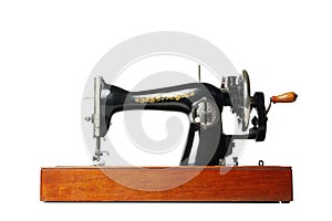 Old vintage sewing machine isolated on white background
