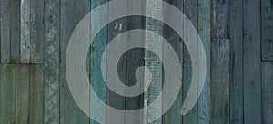 Old vintage shabby green blue tone weathered painted wood banner background