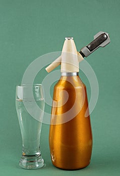 Old vintage siphon and glass of water