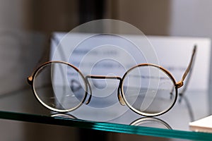 Old vintage spectacle glasses on display in a museum in Aldershot, UK