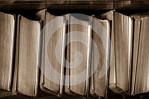 Old vintage stack of books education concept background