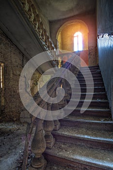 Old vintage staircase in abandoned mansion