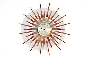 Old vintage star or sun burst shaped wooden wall clock