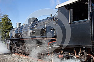 Old vintage steamtrain locomotive letting of stem