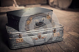 Old vintage suitcases in an attic