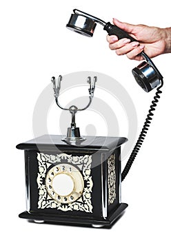 Old vintage telephone on white background photo