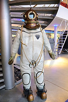 Old vintage three-bolt deep-sea diving suit. Suit for deep sea diving of the last century. The history of the study of