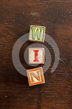 Old Vintage Toy Block Letters Spell Word Win