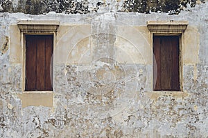 Old vintage traditional wooden window and cement wall