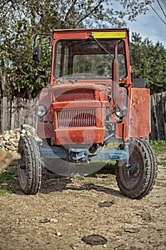 Old vintage traktor in Romania village road