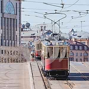 Old vintage tramway cars on the empty city street