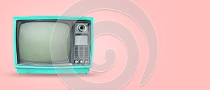 Old vintage tv on pastel color background.