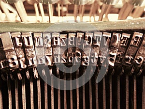 Old vintage typewriter metal letters close up