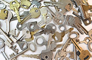 Old vintage various keys pattern. Antique metal gold bronze silver color different clue for padlock. Chaotically mix