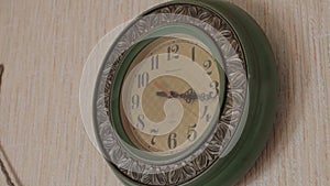 Old vintage wall clock in country house, Belarus