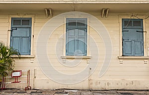 old Vintage window of Historic Building in Wat Phra Kaew office, Temple of the Emerald Buddha, Bangkok, Thailand