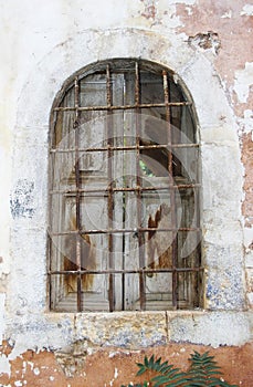 Old vintage Windows with metal bars