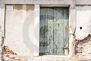 Old vintage wood door with old green window