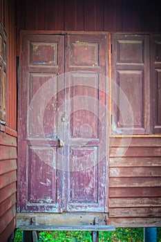 Old vintage wooden brown house door background.