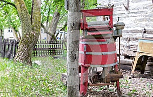 Old vintage wooden red wringer washing machine photo