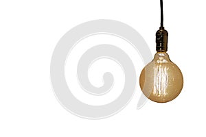 Old vintage yellow  electric lightbulb isolated on white background