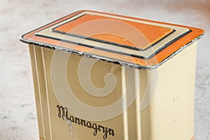 Old vintage yellow orange tin box