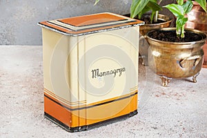 Old vintage yellow orange tin box