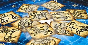 Old vintage zodiac cards with horoscope like astrology concept photo
