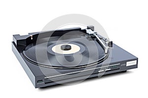 Old vinyl automatic player in work, isolated on white background. File contains a path to isolation