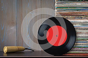 Old vinyl discs and microphone