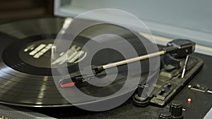 Old vinyl record player turning