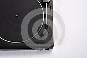 Old vinyl record player on white background