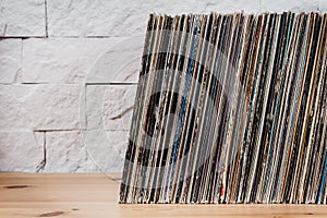Old Vinyl records in the wooden shelf photo
