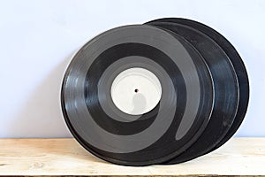 Old vinyl records on a wooden table