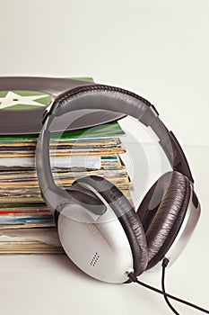 Old vinyls and headphones