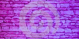 Old violet purple brick wall texture closeup pink stone blocks wall relief template Background