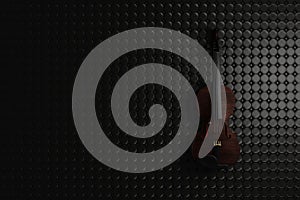 Old violin lying on the leather texture background