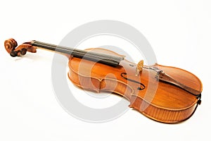 Old violin over white