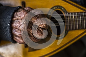 Old virtuoso Hands Play the mandolin photo
