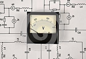 Old voltmeter on electrical circuits