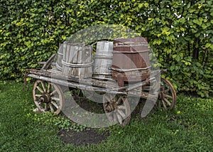 Old wagon with barrels.