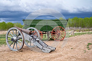 Old wagon and cart outside of Bents Old Fort National Historic Site in Colorado