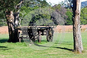 Old wagon in a field in a rural area