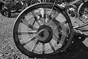 An Old Wagon Wheel among wagon wheels