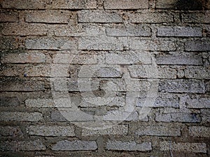 Old wall background, antique cement bricks add a vignette.