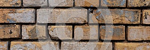 Old wall of bricks or Stones and fugues. Panorama