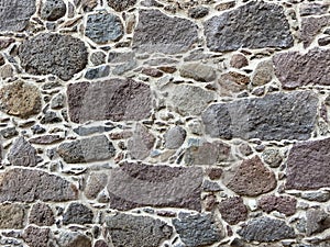 Old wall built with basalt, paulilatino, sardinia photo